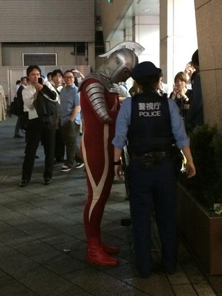 Illustration for article titled Police Stop Japanese Superhero on the Streets of Tokyo
